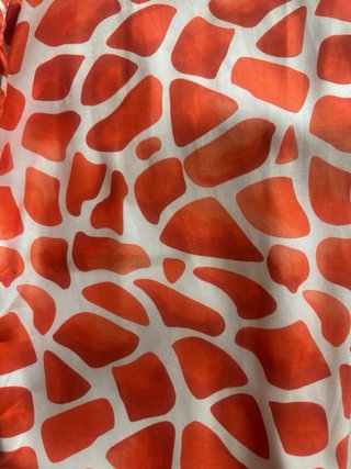 Pantalón naranja y blanco T unica,marca Italiana