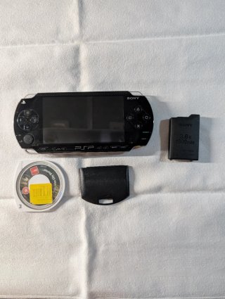 Sony PSP 1004 Nero + Gioco + Accessori