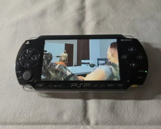 Sony PSP 1004 Nero + Gioco + Accessori