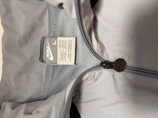Chaqueta cortavientos Nike vintage gris