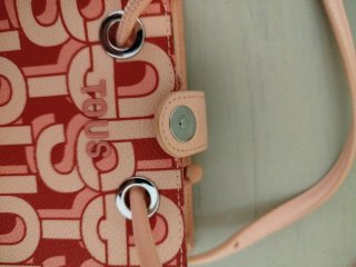 Bolsito Tous estampado rosa y rojo