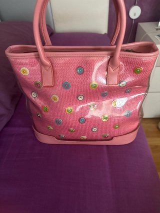 Bolso rosa con adornos de colores