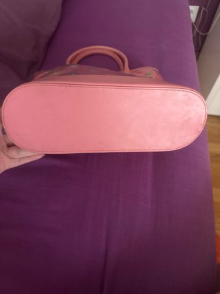 Bolso rosa con adornos de colores