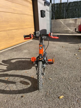 Bicicleta infantil 14" Btwin naranja de iniciación