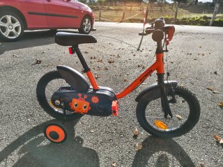 Bicicleta infantil 14" Btwin naranja de iniciación