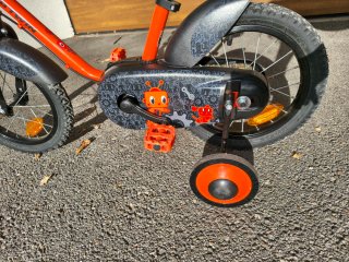 Bicicleta infantil 14" Btwin naranja de iniciación