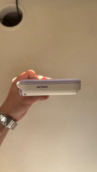 Nintendo 2DS XL con cargador y juegos