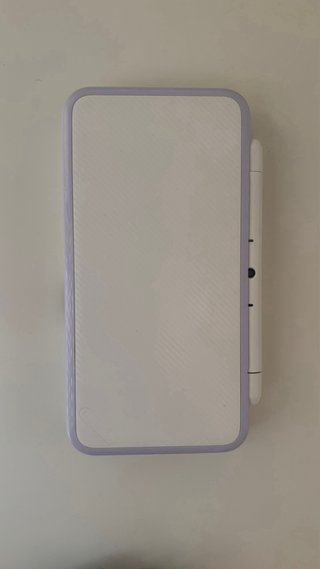 Nintendo 2DS XL con cargador y juegos