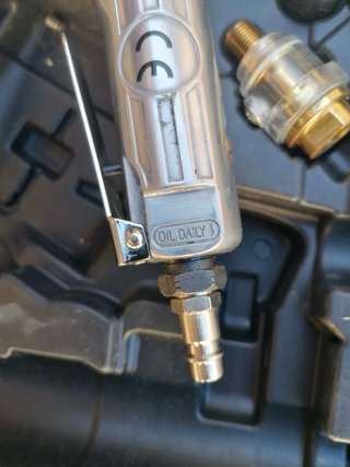 Pistola de impacto neumática y carraca