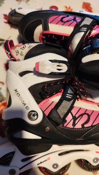 Patines negros y fucsia talla 35-38