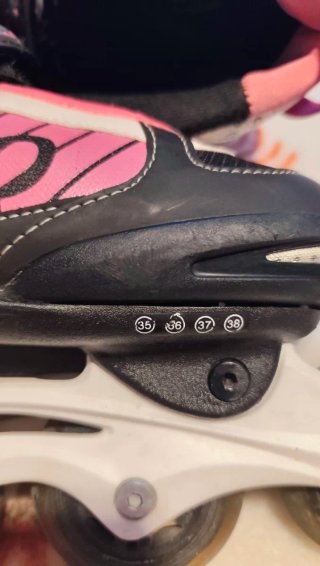 Patines negros y fucsia talla 35-38