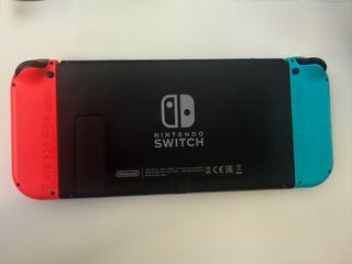 !!Excelente!! Nintendo Switch + Base + accesorios