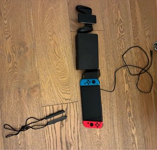 Nintendo Switch OLED (Neon Red / Neon Blue) – Come