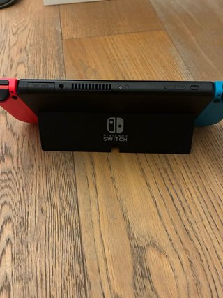 Nintendo Switch OLED (Neon Red / Neon Blue) – Come