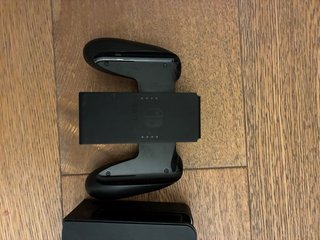 Nintendo Switch OLED (Neon Red / Neon Blue) – Come