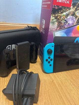 Nintendo Switch OLED mario kart impecable y caja