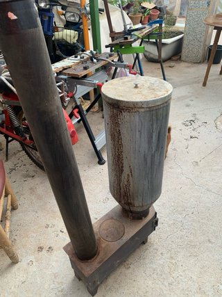 Estufa cáscara almendra metal