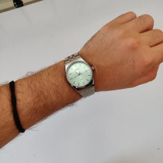 Reloj Casio Quartz Verde y Plateado
