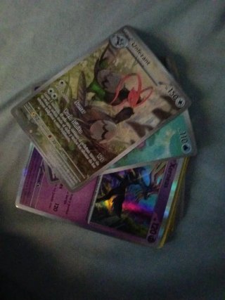 Cromos Pokémon Unfezant y Xerneas