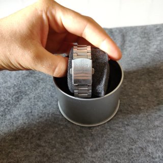 Reloj Casio dial verde y correa plateada