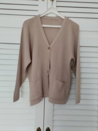 Chaqueta de lana beige para mujer