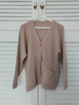 Chaqueta de lana beige para mujer