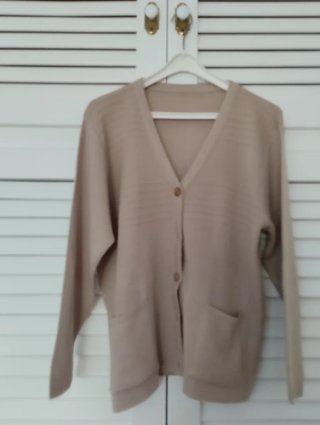Chaqueta de lana beige para mujer
