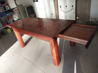 Mesa de comedor extensible de madera