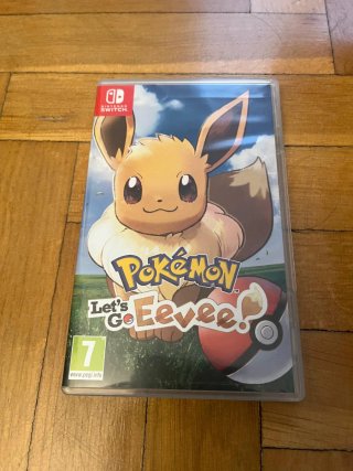 Nintendo Switch + Pokémon Lets Go Eevee + Mando