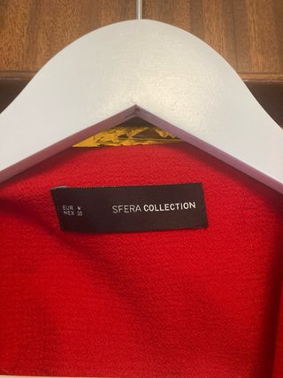 Americana roja con cremalleras