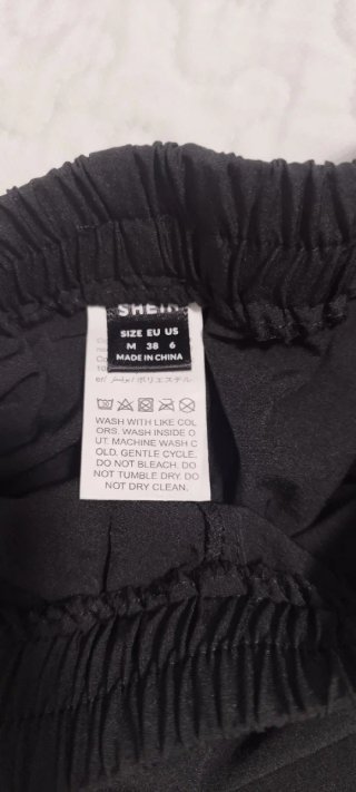 Pantalón corto mujer negro con blanco