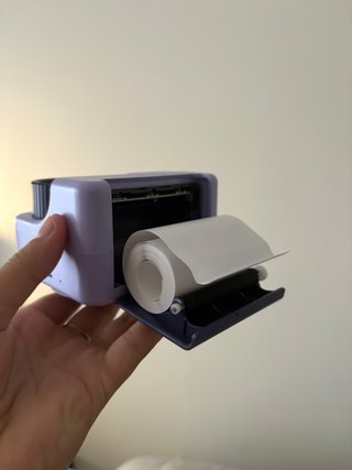 Câmara Instantânea Lilás Nova na Caixa