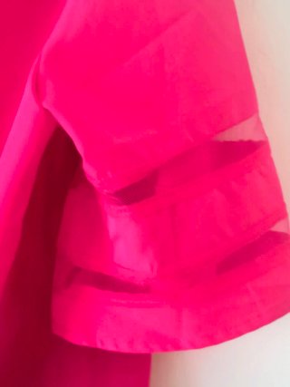 Blusa rosa con volantes