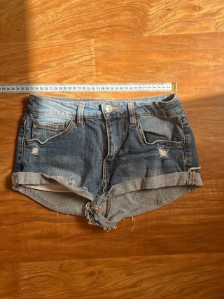 Pantalón de tejanos corto de mujer de niña gris