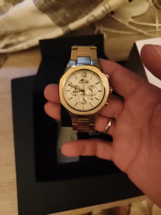 Reloj Lotus Chapado Oro 18k, aún con sus plásticos