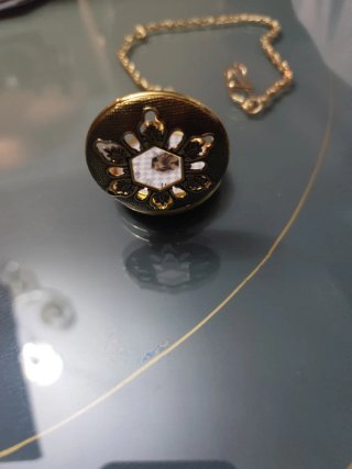 Reloj de bolsillo mecánico dorado