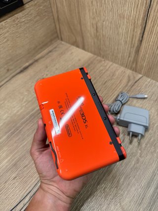 Nuovo Nintendo 3DS XL con IPS nera e arancione