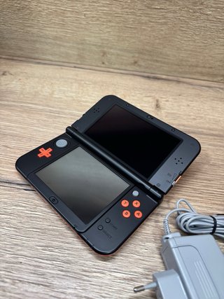 Nuovo Nintendo 3DS XL con IPS nera e arancione