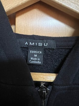 Sudadera negra con cremallera
