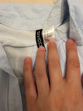 Camisa sin mangas azul a rayas