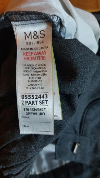 Pantalón corto uniforme gris