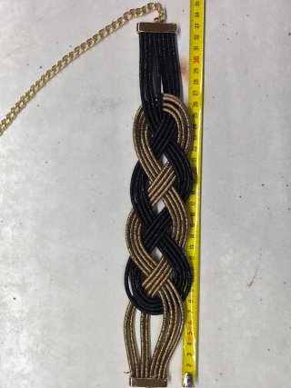 Cinturón cadena dorada y goma negra