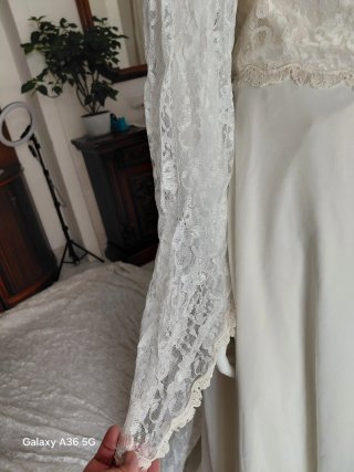 Abito da sposa pizzo manica lunga