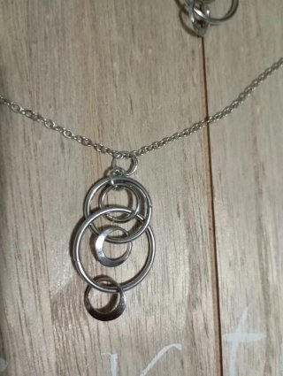 Conjunto collar y pendientes círculos