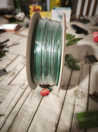 Rollo de cable verde
