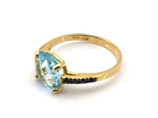 sortija oro 18k con piedra con topacio,zafiro