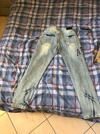 Jeans Amiri Blu Lavaggio Strappati