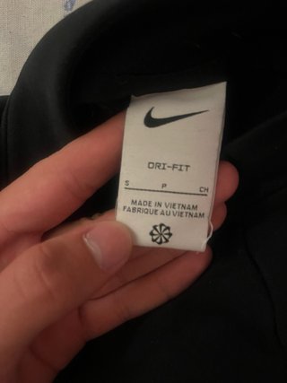 Chaqueta Nike negra y blanca
