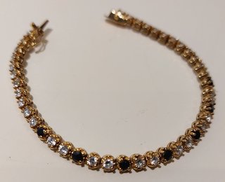 Pulsera b. Oro 18k, plata de ley 925 y 42 zafiros