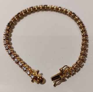 Pulsera b. Oro 18k, plata de ley 925 y 42 zafiros